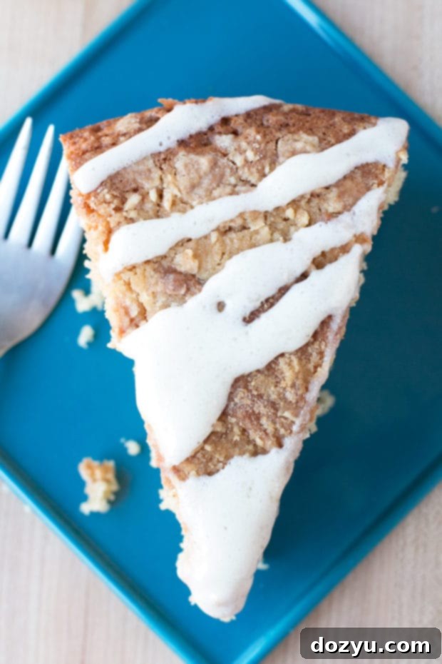 Moist Almond Butter Yogurt Coffee Cake with lemon cream cheese frosting, perfect for breakfast or brunch.