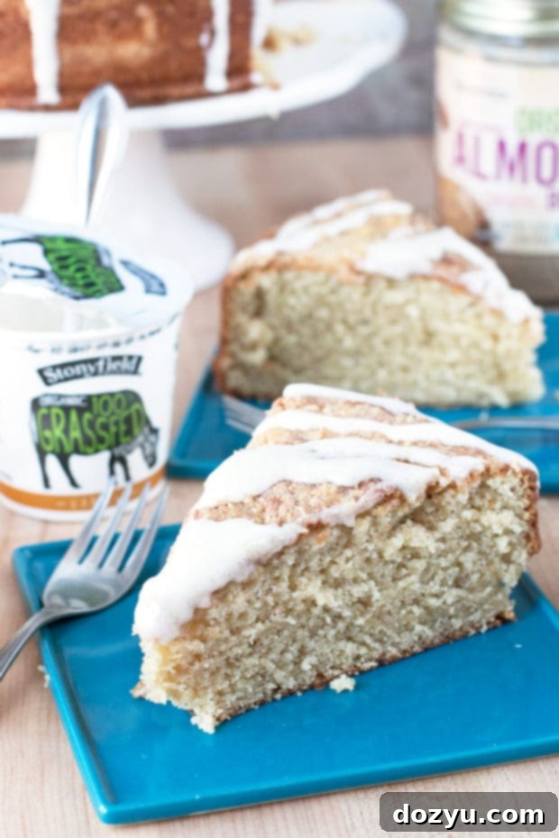 Close-up of Almond Butter Yogurt Coffee Cake slice, showing moist texture and streusel topping.