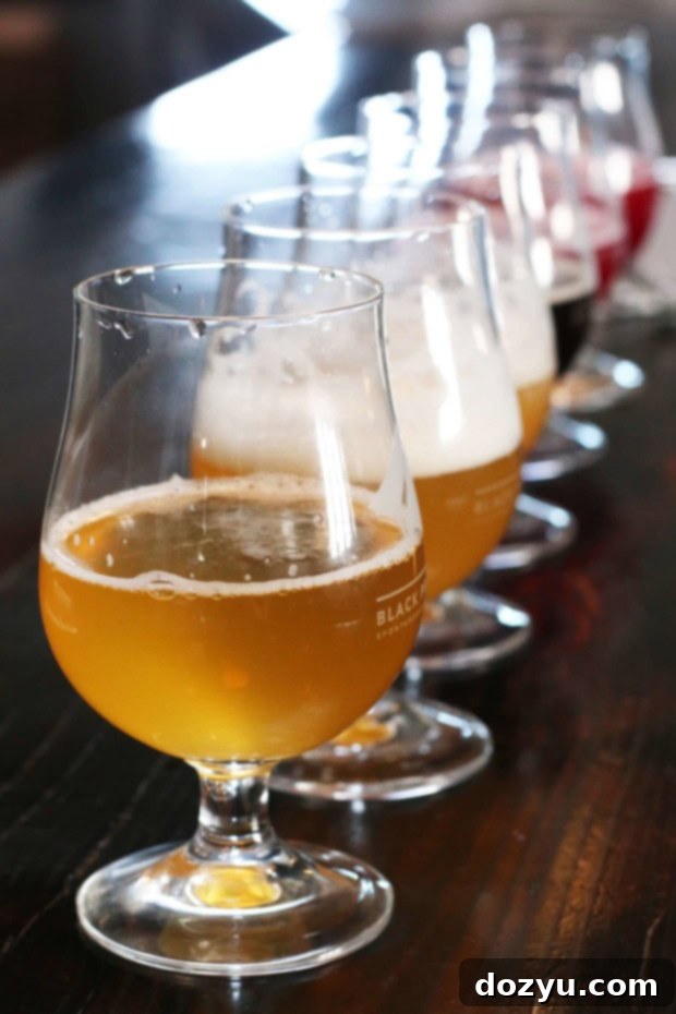 Diverse glasses of innovative beers at Black Project, an essential stop on the Denver Beer Crawl