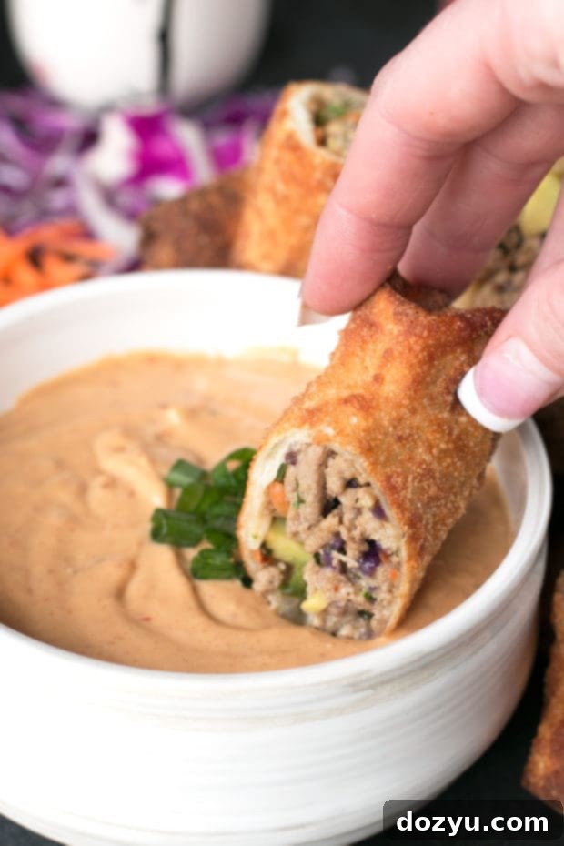 Uncooked Thai Turkey Avocado Egg Rolls ready for frying