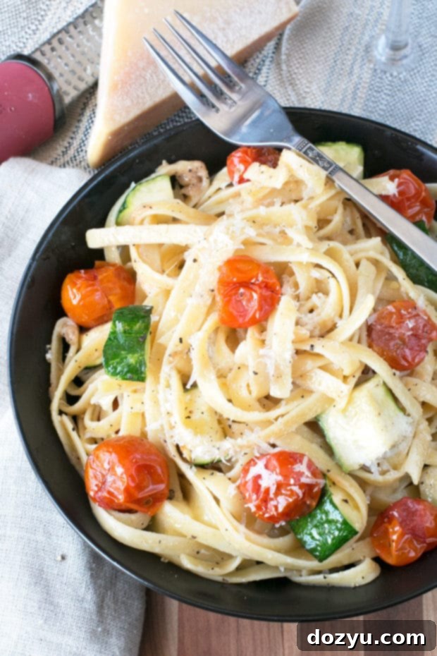 Overhead shot of Brown Butter Spring Vegetable Fettuccine in a white bowl