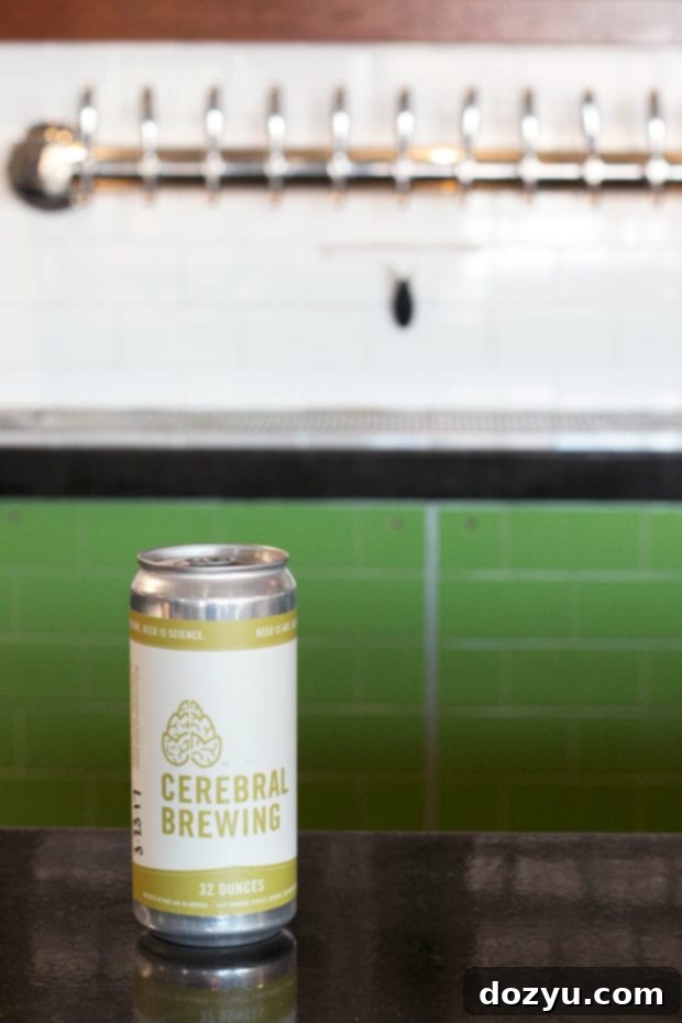 Cerebral Brewing taproom interior with a bright, lab-inspired design and high-top tables