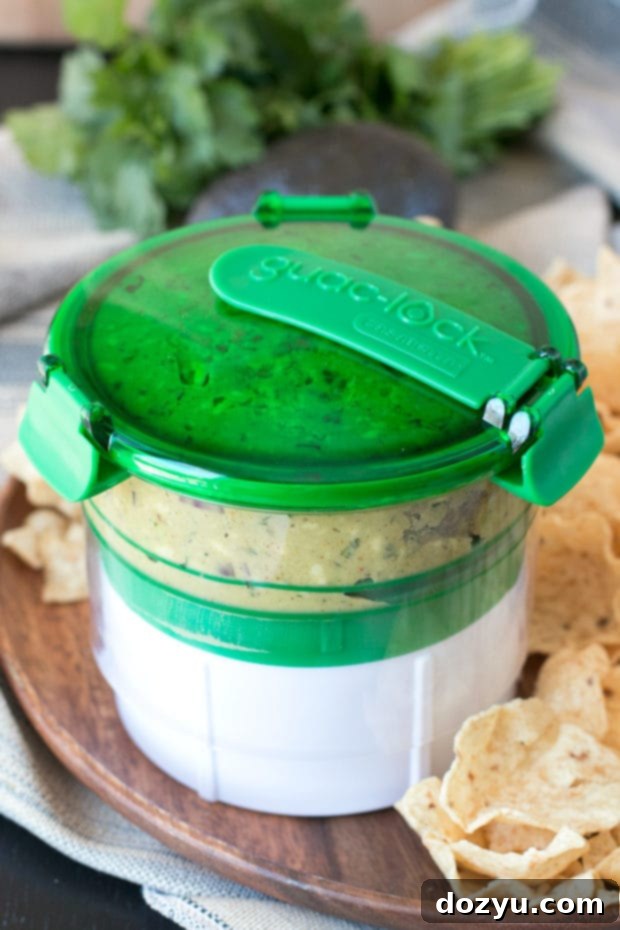Chipotle Chorizo Guacamole stored in a Guac-Lock container to prevent browning.