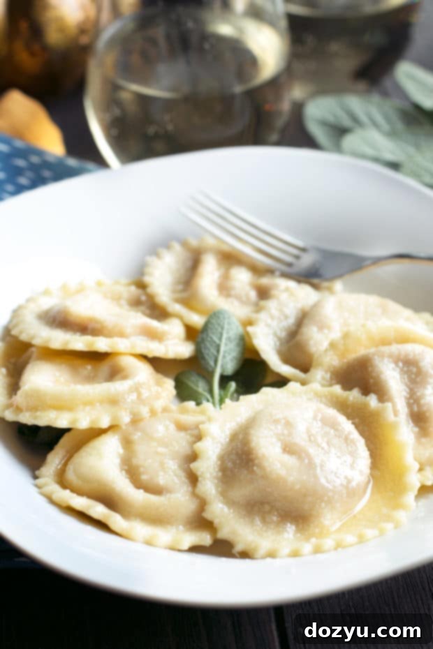 Autumn Pumpkin Pillows with Aromatic Sage Butter 6 Freshly plated pumpkin ricotta ravioli with brown butter sage sauce