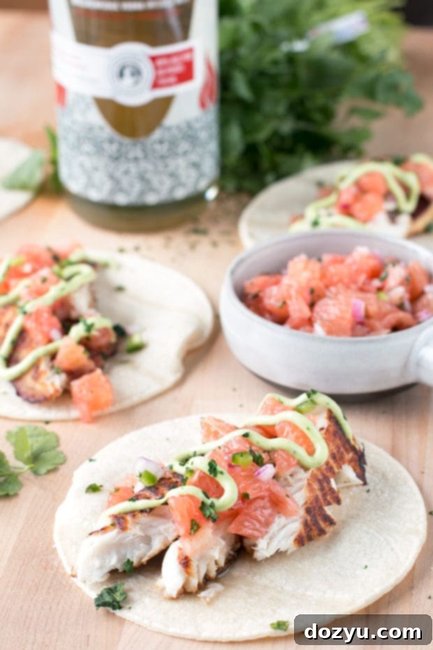 Spicy Grilled Fish Tacos with a Vodka Kick 2 Flavorful Grilled Chile Vodka Fish Tacos with fresh toppings and lime