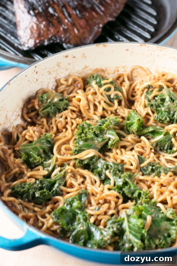 Soy Marinated Flank Steak with Creamy Kale Peanut Noodles | cakenknife.com #dinner #datenight #pasta #steak