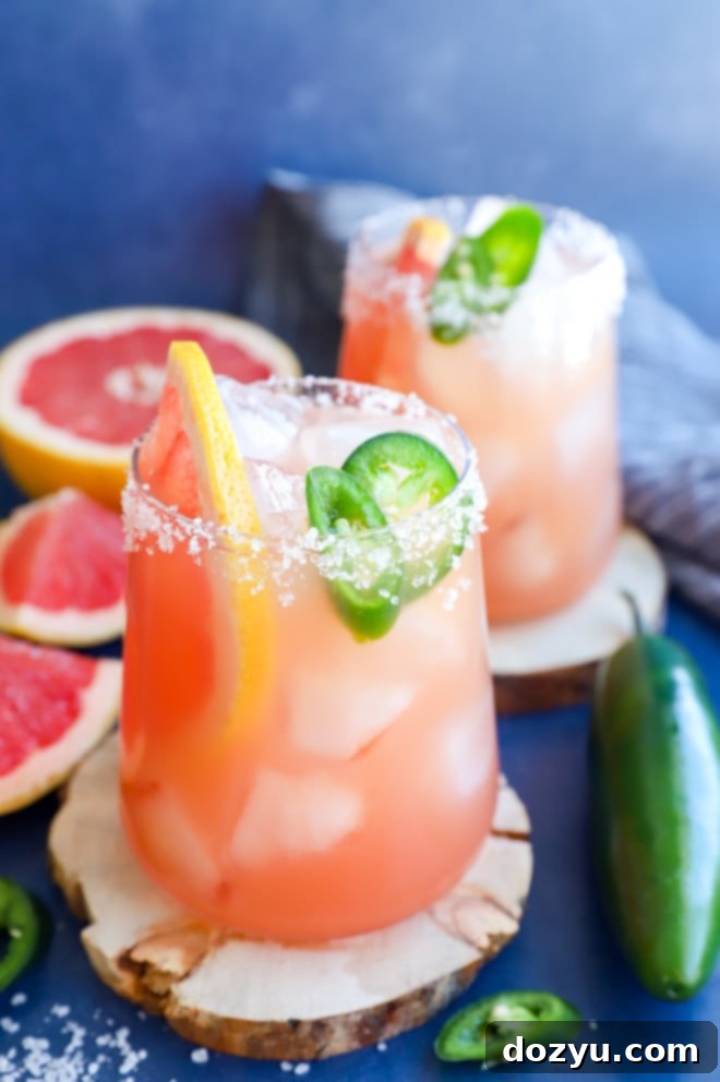 Easy grapefruit cocktail in glasses with fresh fruit