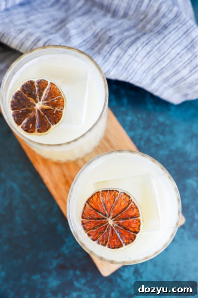 Soju yogurt cocktail with garnish in glasses with ice