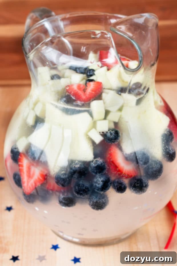 Close-up of a refreshing Patriotic Tom Collins Punch ready for serving