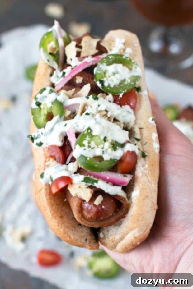 Fiery Bacon Brats Crowned with Zesty Pickled Red Onions 5 Delicious spicy bacon-wrapped bratwurst with fresh toppings, ready to be served at a summer party. Emphasizes the rich flavors and textures.