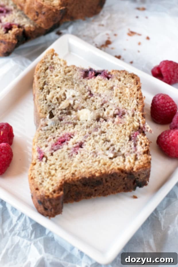 The whole Raspberry Lemon White Chocolate Chip Loaf, freshly baked and golden brown.