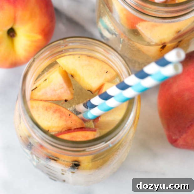 Sparkling Grilled Peach Sangria | cakenknife.com #grilling #peaches #wine #cocktail