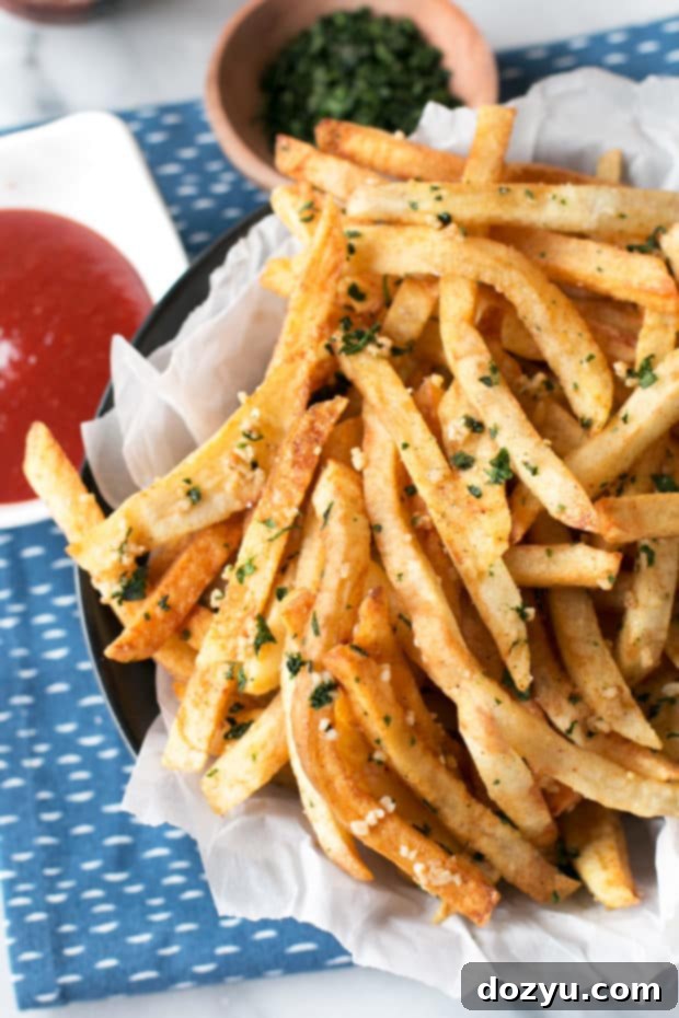 Signature Spicy Garlic Cilantro Fries with Curry Ketchup 2 Spicy Garlic Cilantro Fries with Curry Ketchup | cakenknife.com #frenchfries #streetfries #snack
