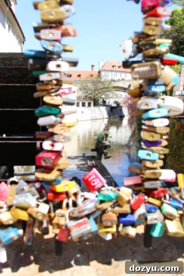 Unlocking Prague's Culinary Secrets in 48 Hours 29 The charming troll statue near Lennon Wall