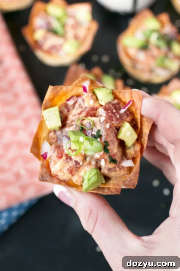 Ingredients for spicy tuna poke including diced tuna, avocado, and spices