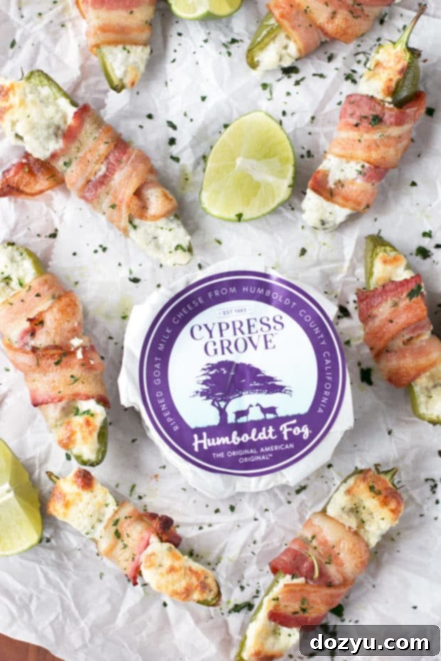 Goat Cheese Stuffed Bacon Wrapped Jalapeños | cakenknife.com #sponsored #goatcheese #tailgating