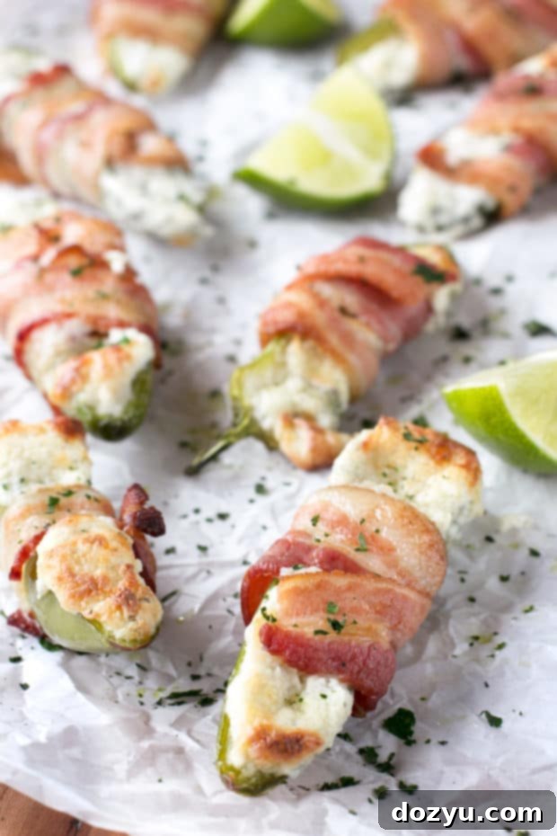 Goat Cheese Stuffed Bacon Wrapped Jalapeños | cakenknife.com #sponsored #goatcheese #tailgating
