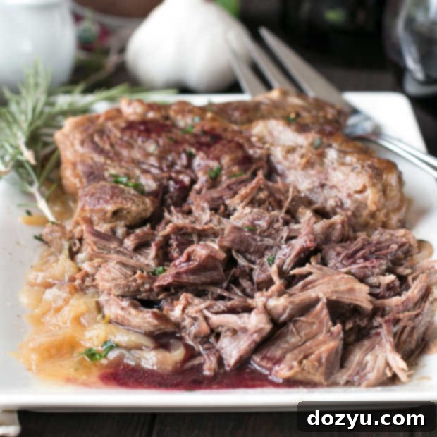 Slow Cooker Garlic Rosemary Pot Roast with Red Wine Sauce | cakenknife.com #ad #roastwiththemost #potroast #crockpot