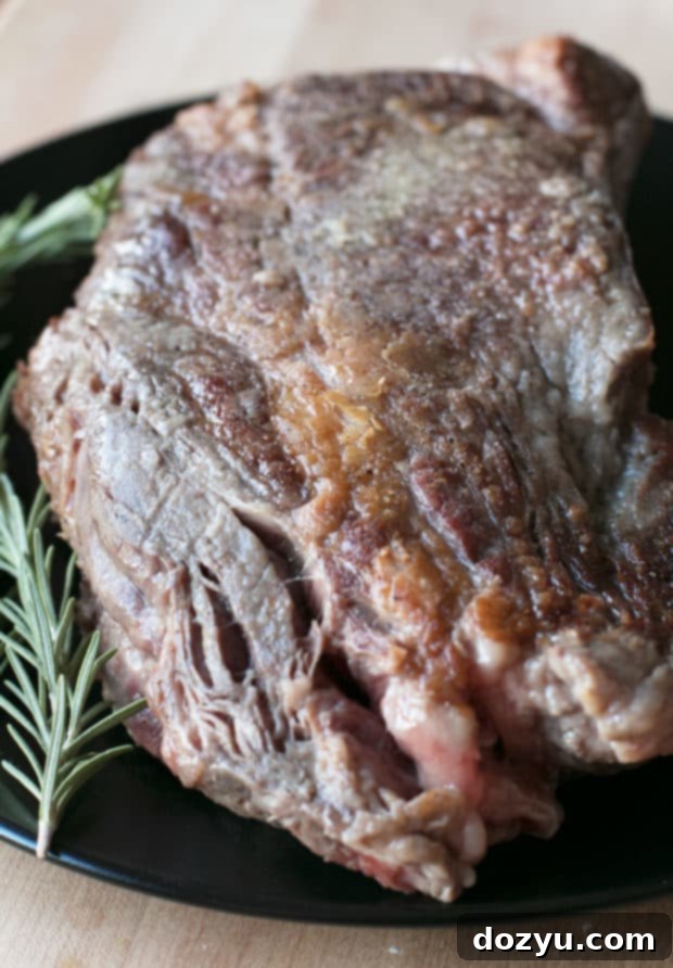 Slow Cooker Garlic Rosemary Pot Roast with Red Wine Sauce | cakenknife.com #ad #roastwiththemost #potroast #crockpot