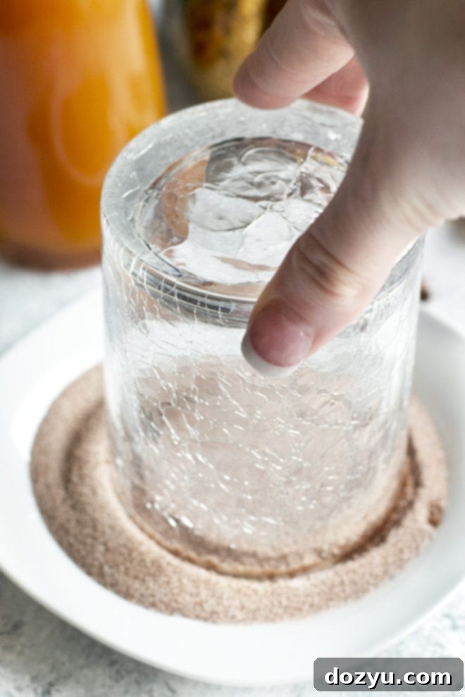 Harvest Pumpkin Bourbon 6 rimming a glass with cinnamon sugar picture