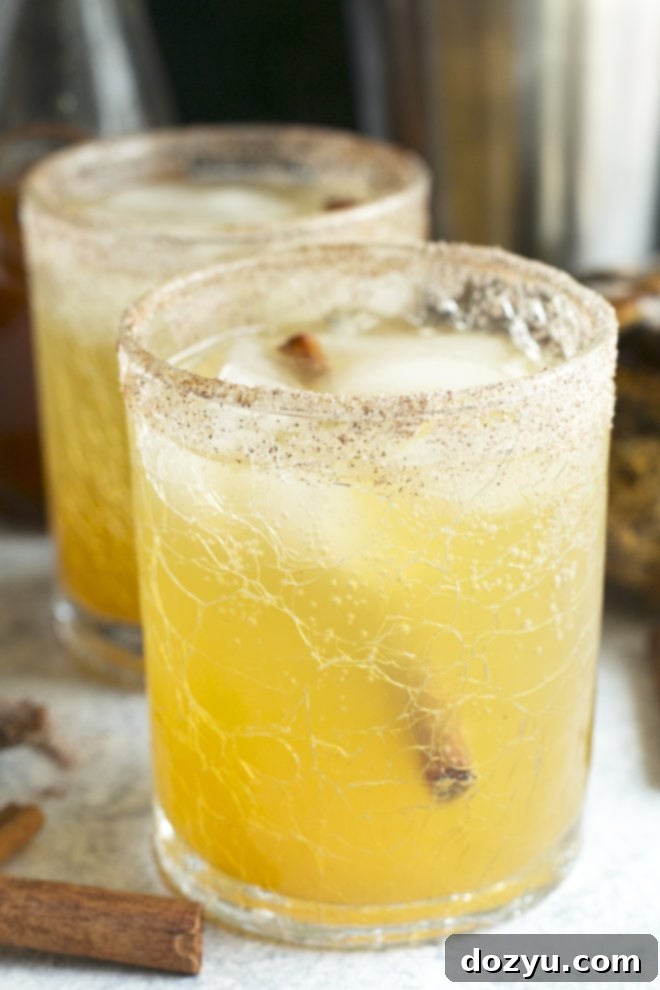 Harvest Pumpkin Bourbon 8 Side image of pumpkin bourbon smash cocktail in glasses