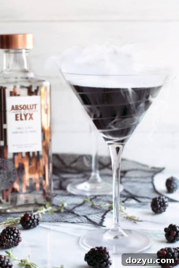 Absolut Elyx's Spellbinding Black Magic Martini 3 Absolut Elyx Black Magic Martini, perfect for a cozy Halloween night in or a themed party.