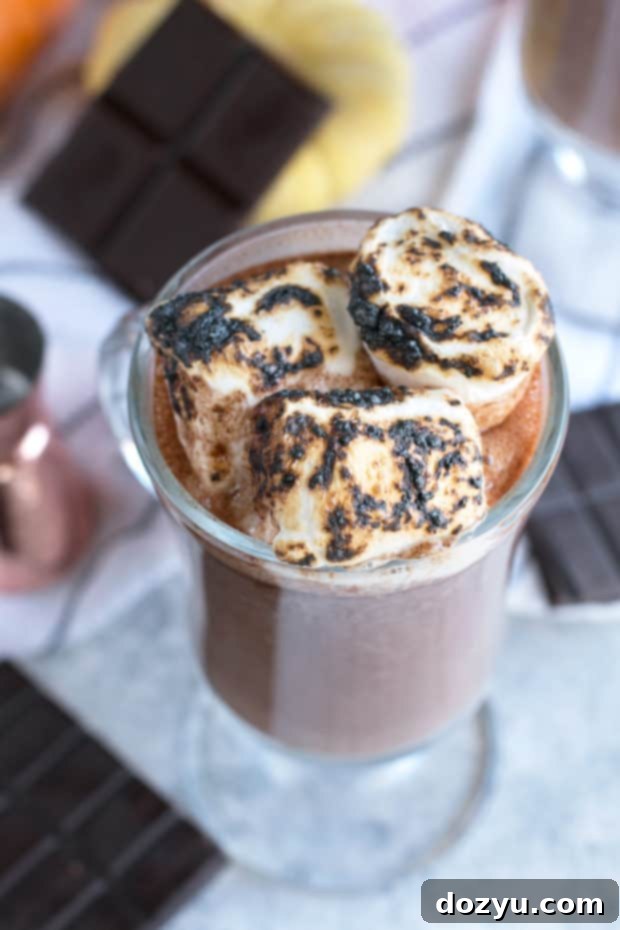 Pumpkin Bourbon Hot Chocolate | cakenknife.com #hotchocolate #pumpkinspice #fall #cocktail