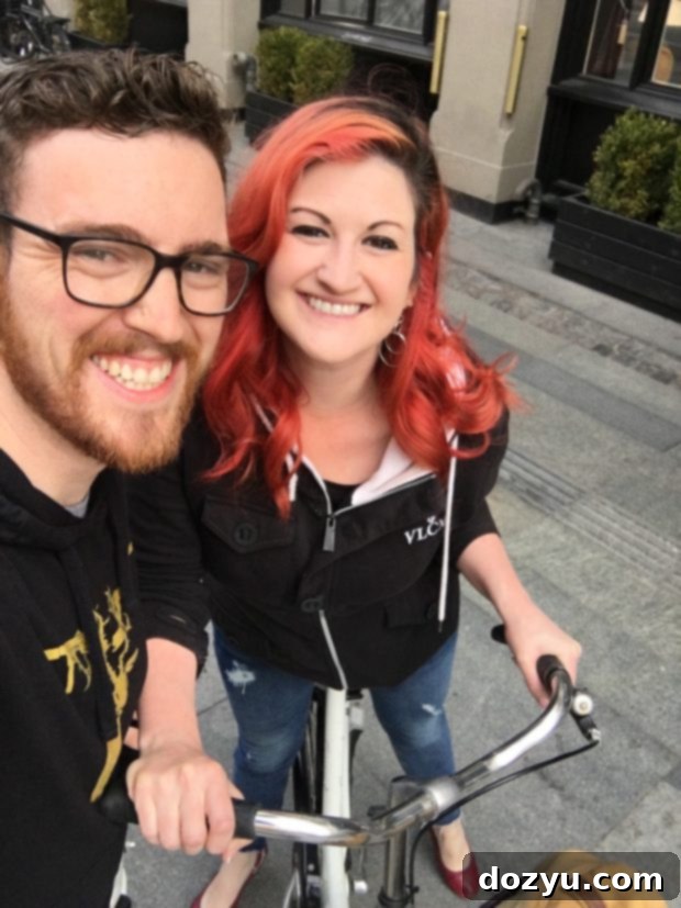 Copenhagen's Flavors: A 48-Hour Foodie Itinerary 26 A person cycling along a canal in Copenhagen