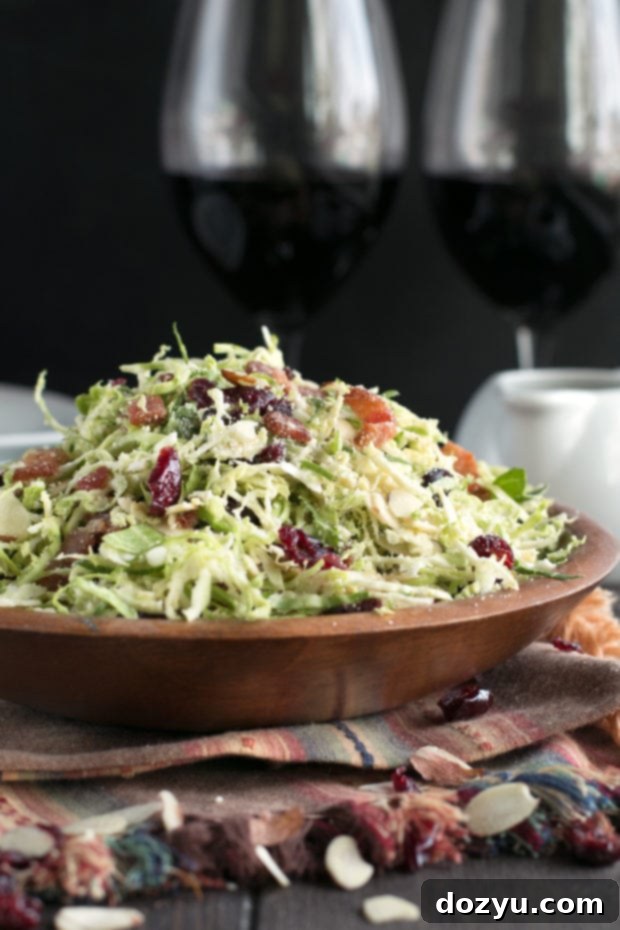 Crispy Bacon & Cranberry Brussels Slaw 4 Bacon Cranberry Shaved Brussels Sprouts Salad | cakenknife.com #salad #thanksgiving #sidedish #healthy