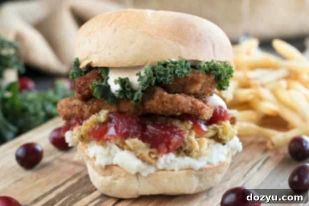 A close-up of golden-brown fried turkey pieces, ready to be assembled into a Thanksgiving leftover sandwich.