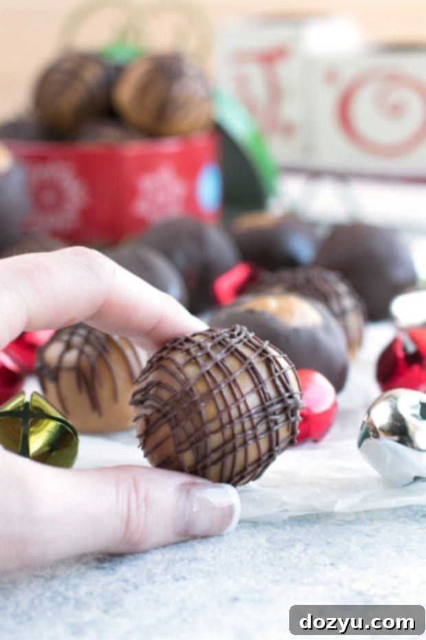 Bourbon Spiked Buckeye Crunch 4 Crispy Bourbon Buckeyes | cakenknife.com #dessert #chocolate #christmas #holiday #cookies #sweetestseason