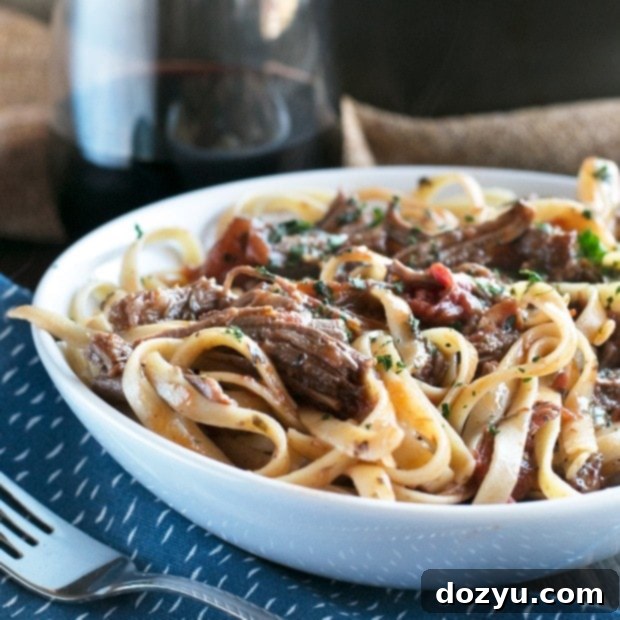 Red Wine Slow Cooker Short Rib Ragu with Fettuccine | cakenknife.com #sponsored #holidaymeal #dinner #pasta #beef