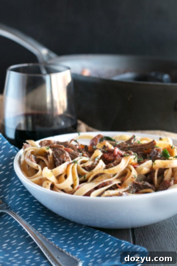 Red Wine Slow Cooker Short Rib Ragu with Fettuccine | cakenknife.com #sponsored #holidaymeal #dinner #pasta #beef