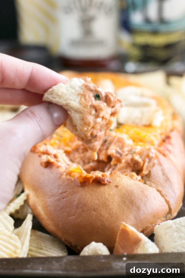 Overhead view of the Cheesy Pulled Pork BBQ Bread Dip, highlighting its appealing presentation.
