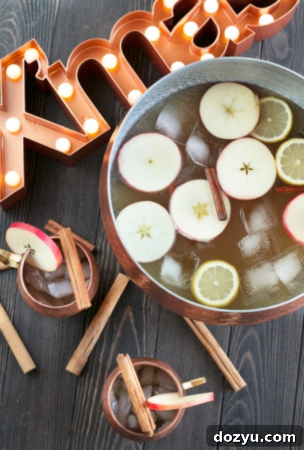 Gingerbread Bourbon Punch, a festive big batch cocktail with bourbon, ginger beer, and gingerbread spices, perfect for holiday entertaining.