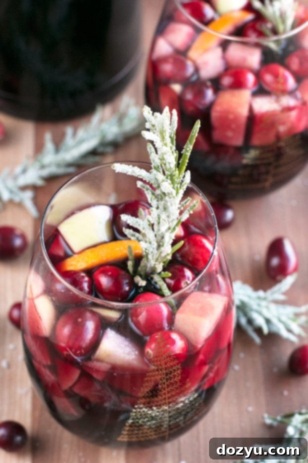 Red Christmas Single Serve Sangria ready to drink with frosted rosemary