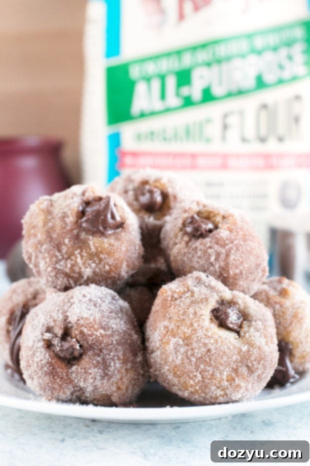 Close-up of a Nutella Filled Donut Hole with Filling Visible