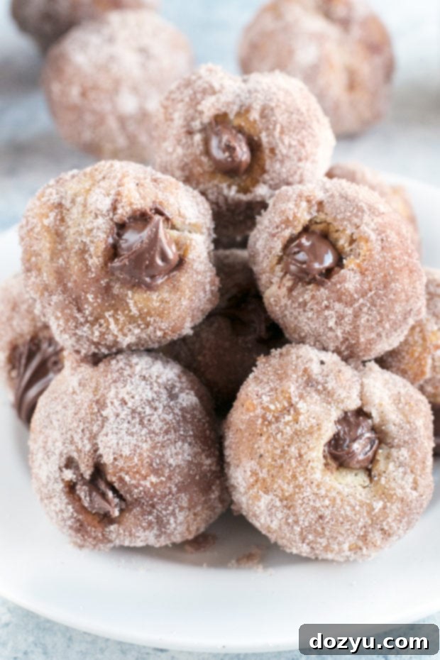 Drizzling Nutella on Cinnamon Sugar Donut Holes