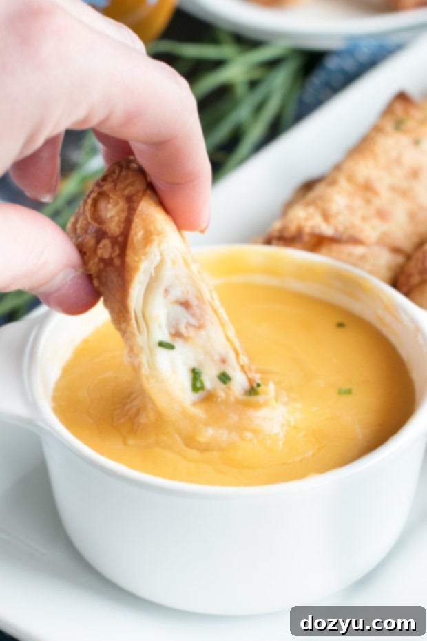 Crispy Loaded Mashed Potato Egg Rolls 7 A platter of Loaded Mashed Potato Egg Rolls arranged for serving