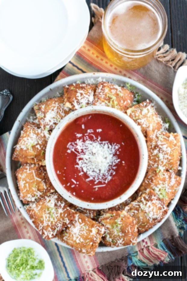 Close-up of crispy Berbere Fried Ravioli on a plate, showcasing its golden color and texture