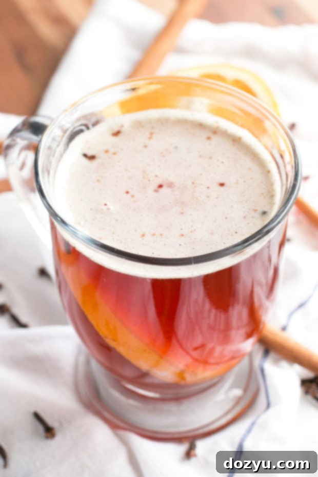 Cozy Mulled Ale with orange slices, perfect for cold weather