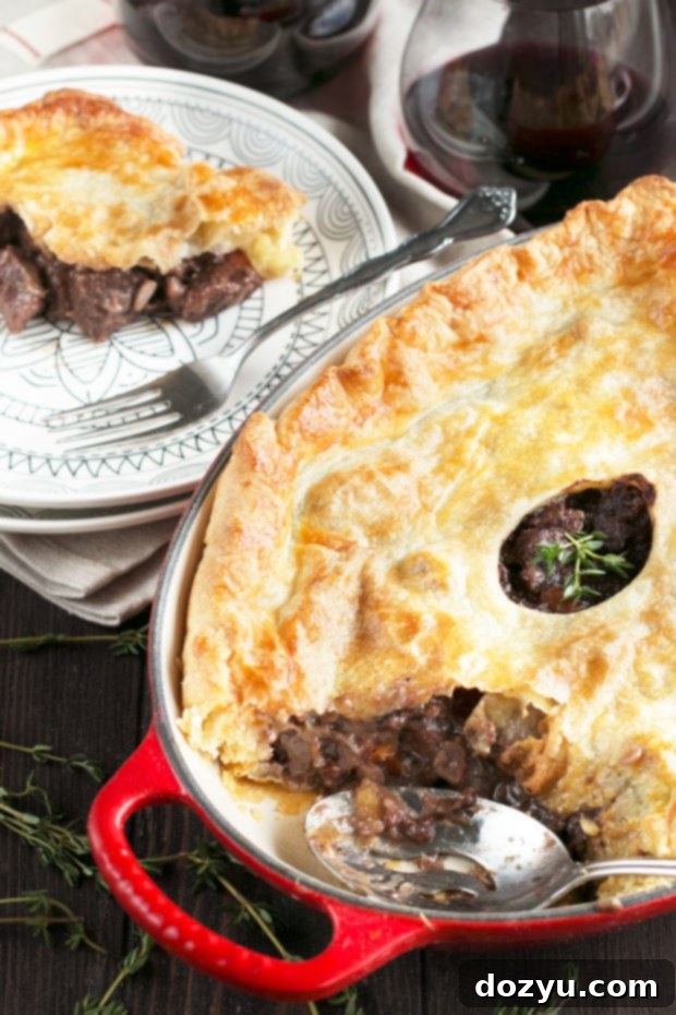 Burgundy Beef Comfort Pie 2 A delicious Boeuf Bourguignon Pot Pie with a golden puff pastry crust