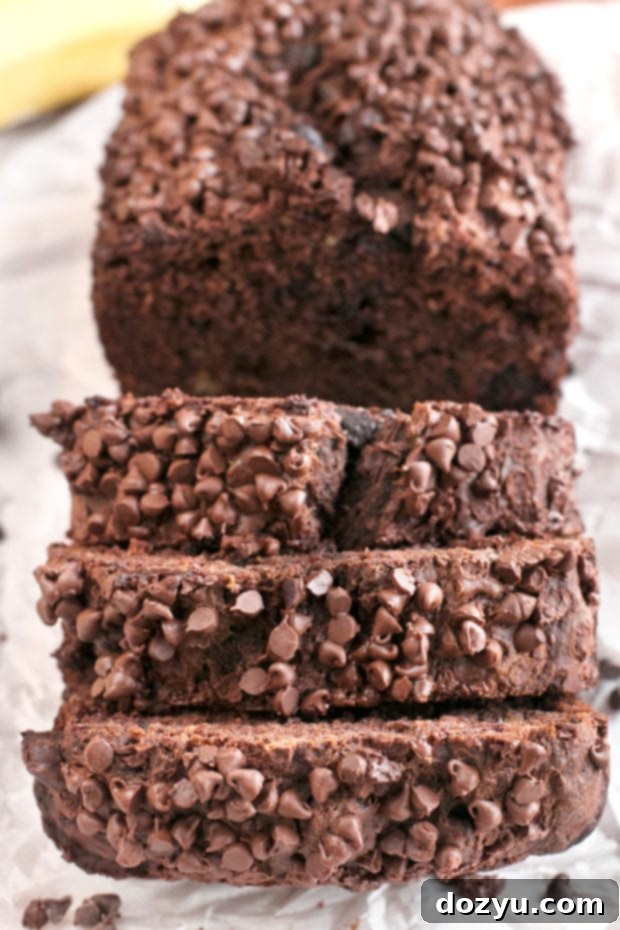 Double Chocolate Avocado Banana Bread slices, showing moist texture and chocolate chips