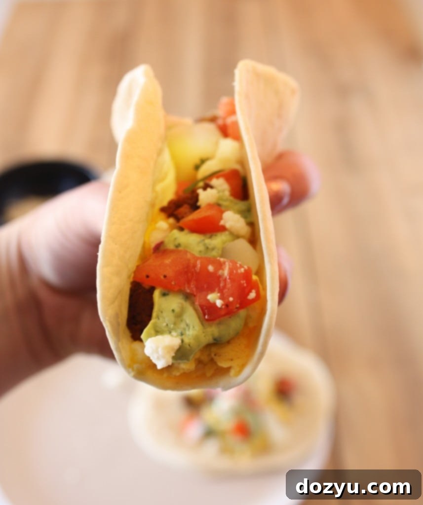 Handheld Morning Magic 2 Close-up of a Fully Loaded Breakfast Taco
