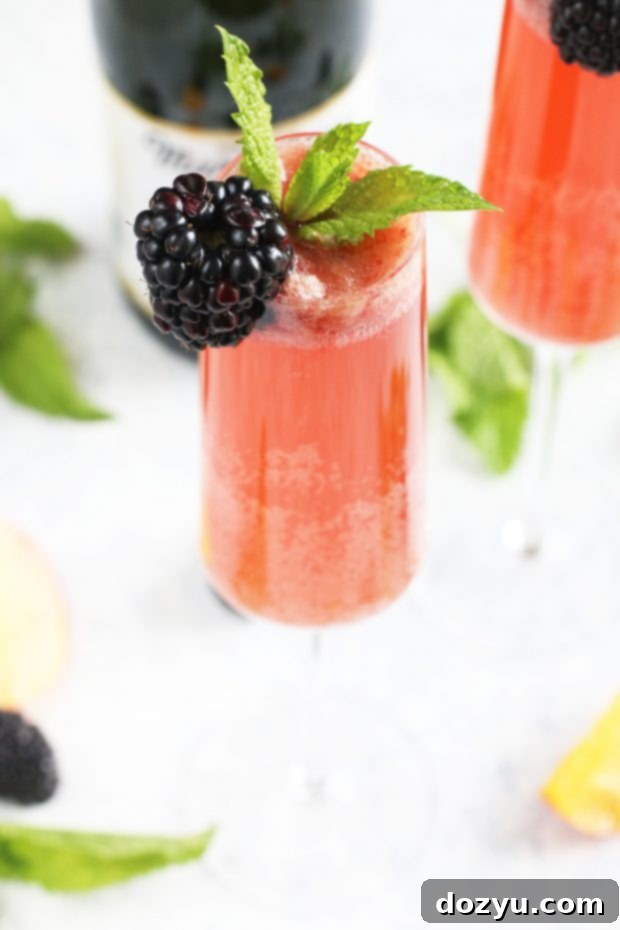 Sparkling Cider Blackberry Peach Bellini Mocktail