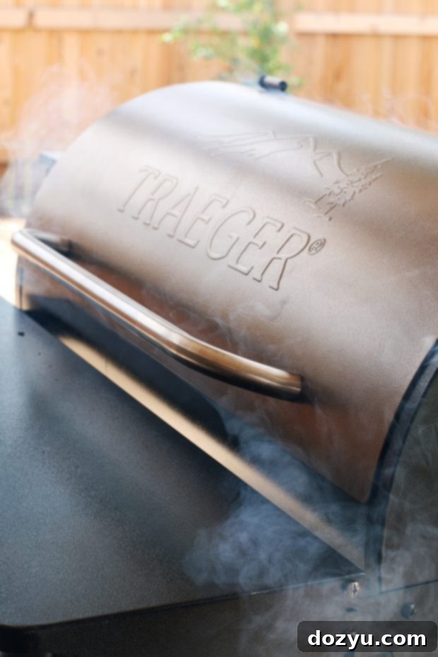 A vibrant close-up of perfectly grilled beer marinated chicken wings, showing crispy skin and succulent meat.