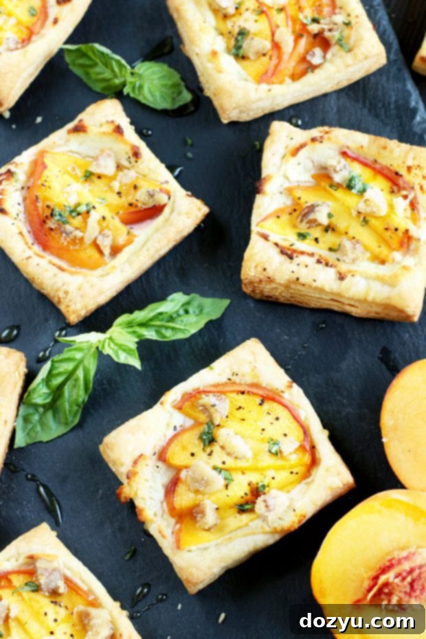 Fresh Peach Basil Goat Cheese Tarts 6 Unbaked Peach Basil Goat Cheese Tarts on a baking sheet