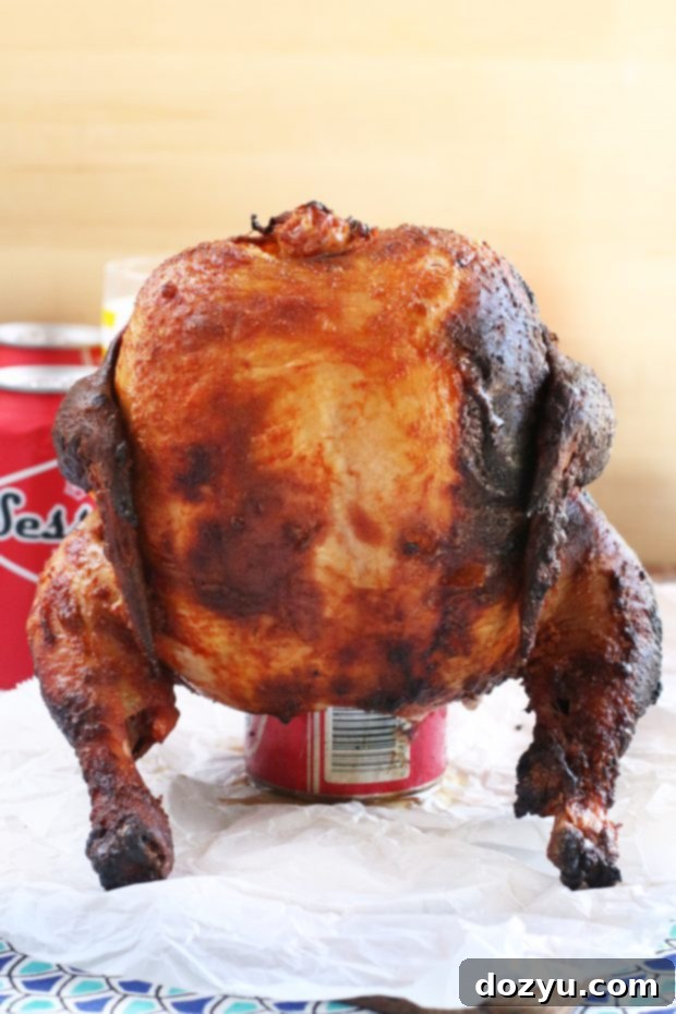Beer Brined Beer Can Chicken served on a cutting board