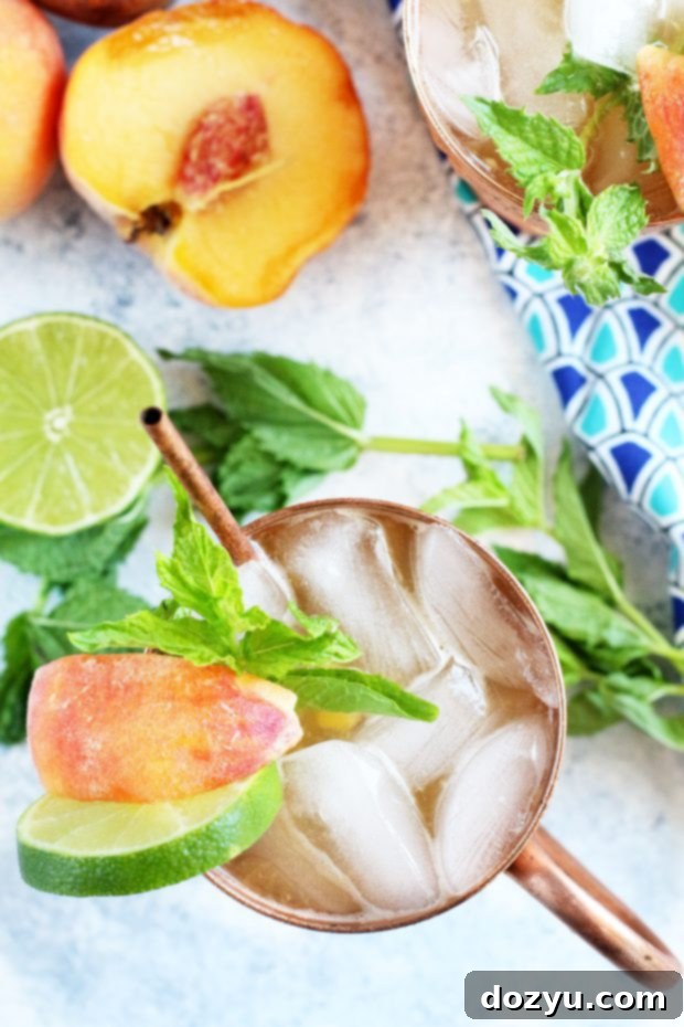 Ingredients for Peach Mint Moscow Mule laid out beautifully