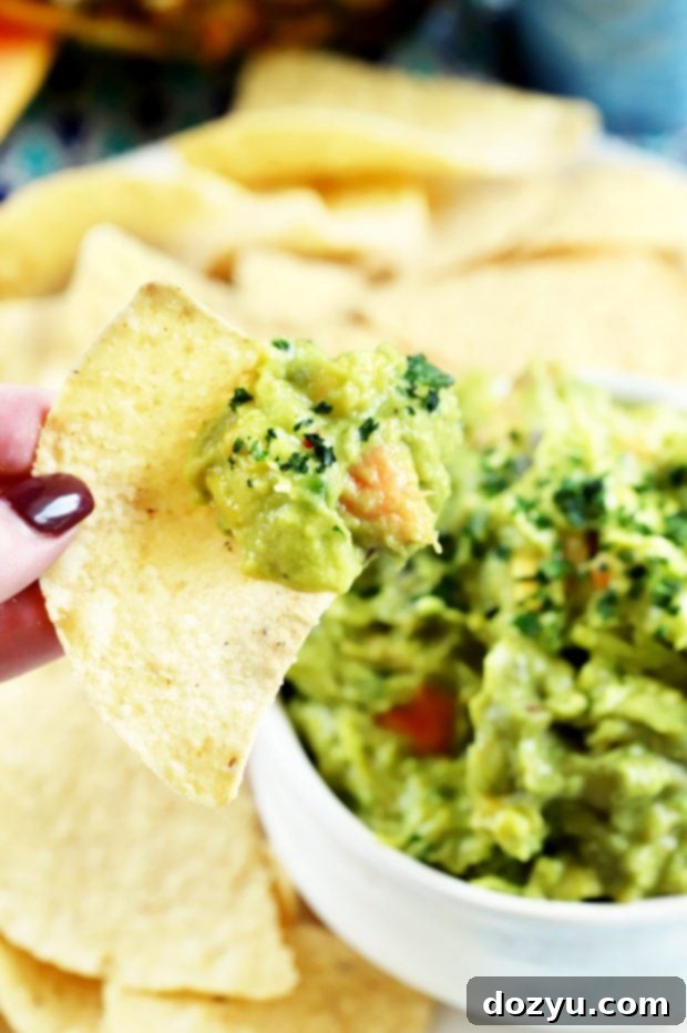 Close-up of Tropical Guacamole with fresh ingredients